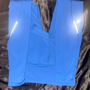 BLUE LULULEMON LEGGINGS WITH ZIPPERED POCKETS
